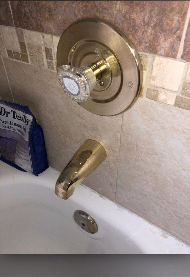 Brass bathroom fixture installation